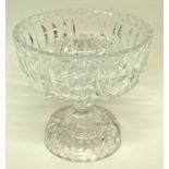 Large heavy leaded crystal bowl raised on a domed foot with cut glass design, the bowl 22cm diam