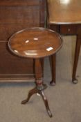 Small mahogany wine table with carved support, approx 36cm diam