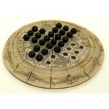 Solitaire board with scrimshaw type decoration, signed by John Adams, together with a quantity of