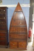 Unusual modern boat shaped hardwood bookcase constructed from recycled timbers, height approx 185cm