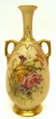 Royal Worcester blush ground vase decorated with flowers with small angular handles picked out in