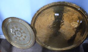 Two large brass trays with geometric designs (2)