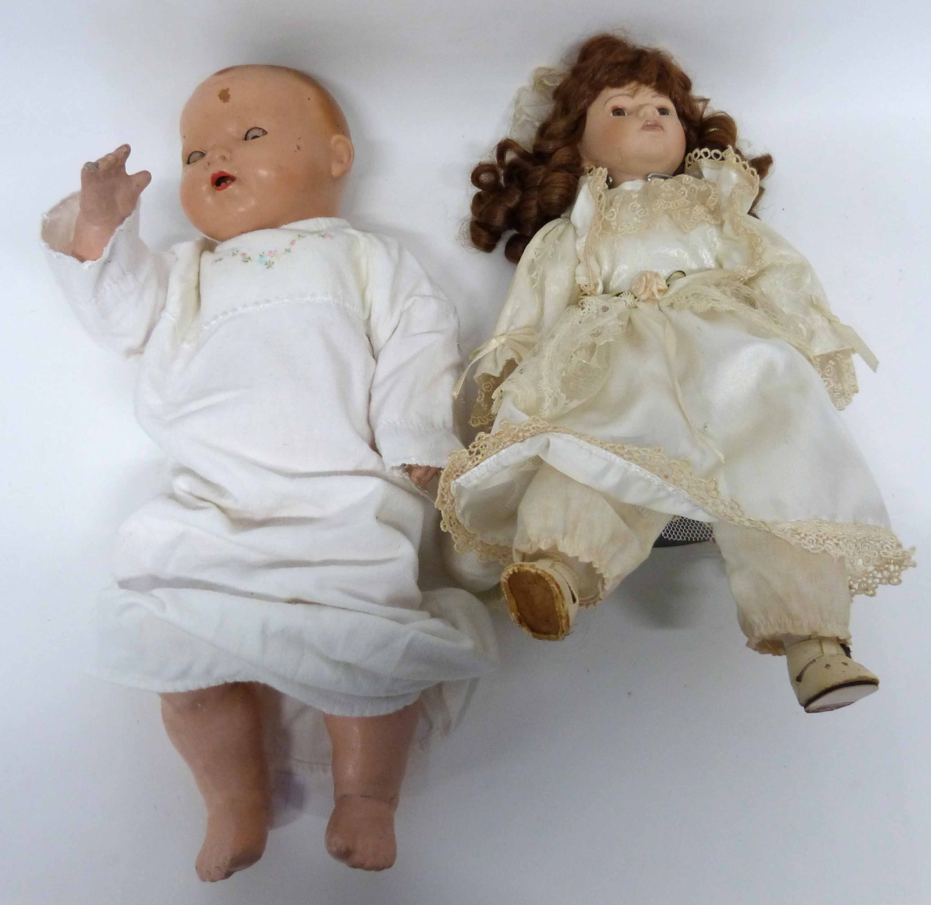 Quantity of dolls, one with head impressed "H W Germany", and further modern doll in original