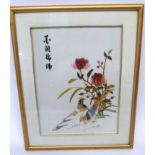 Chinese embroidery of pheasants within flowers, in gilt frame