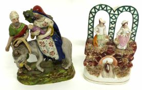 Pearlware group of Mary and Joseph with The Flight to Egypt (damages), together with a small