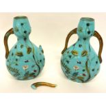 Pair of green glass vases painted with an aesthetic style patter after Christopher Dresser (2), 25cm