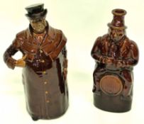 Royal Doulton Kings ware flask, modelled as a coachman with treacle glazes, together with a