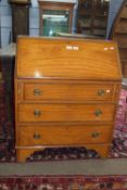 19th century satinwood fall front bureau, with fitted interior over three drawers raised on