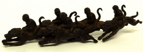 Group of monkey jockeys, metal models with monkeys astride racing dogs, 18cm long