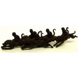 Group of monkey jockeys, metal models with monkeys astride racing dogs, 18cm long