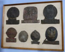 Quantity of mounted fire marks, some vintage, some reproduction