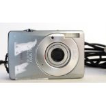 Canon Ixus 75 digital camera, together with charger and manual