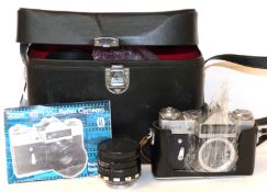 Zenit-E film camera together with a helios-44-2 lens made in the USSR in fitted case