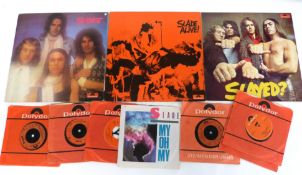 Three Slade LPs and six singles. Condition VG to VG+.