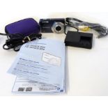 Olympus FE - 5020 plus charger and manual