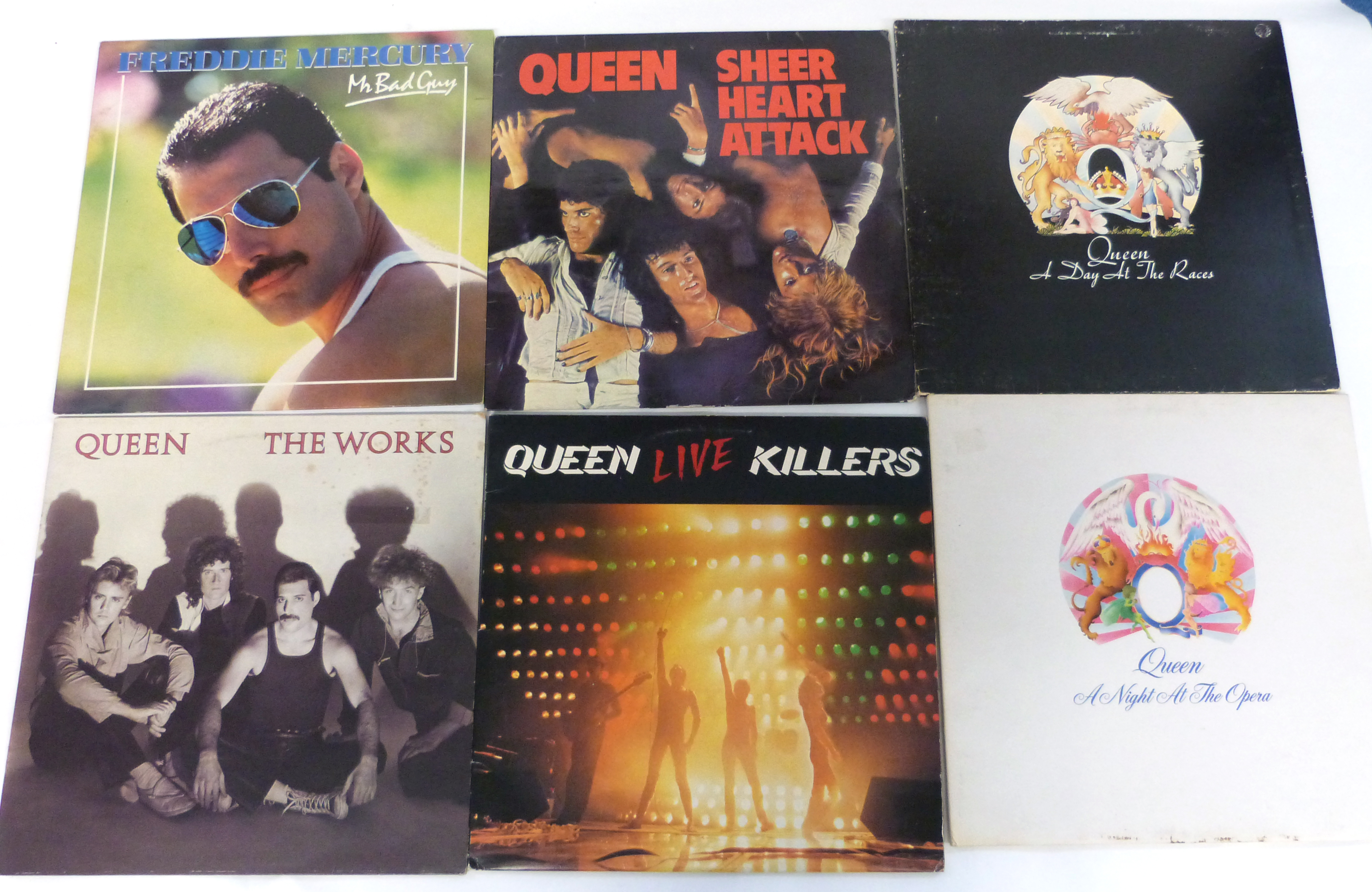 A small collection of Queen LPs and a Freddie Mercury LP. Condition VG to VG+.