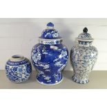 LARGE CHINESE PORCELAIN JAR AND COVER WITH PRUNUS DESIGN TOGETHER WITH A FURTHER JAR AND COVER