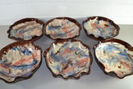 POTTERY BOWLS WITH A SWIRLING DESIGN