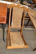 EARLY 20TH CENTURY CANE SEATED FOLDING CHAIR, WIDTH APPROX 43CM