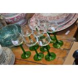 EIGHT WINE GLASSES WITH GREEN STEMS