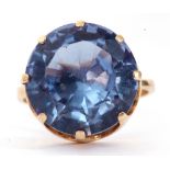 Modern 585 stamped single blue stone dress ring, round faceted shape, 12mm diam, coronet set in a