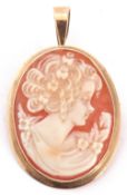 Carved shell cameo brooch/pendant depicting a profile of a classical lady, framed in a 375 stamped