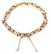 Vintage 15ct stamped bracelet, the oval open work links alternate set centring a turquoise and a