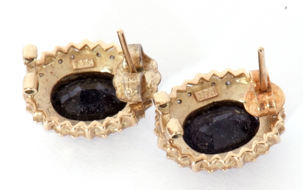 Pair of modern 9ct gold diamond and synthetic sapphire earrings, the faceted oval sapphires in a cut - Image 4 of 7