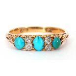 Antique turquoise and diamond ring featuring three graduated oval cabochon turquoises highlighted