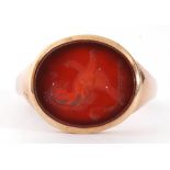 Antique lion carnelian intaglio gold signet ring, the carnelian engraved with a rampant lion