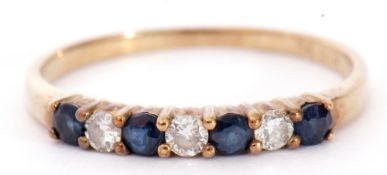 Diamond and sapphire half eternity ring, alternate set with four round cut sapphires and three small