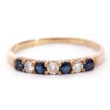 Diamond and sapphire half eternity ring, alternate set with four round cut sapphires and three small