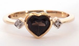 Modern 9ct gold and diamond heartstone ring, the centre heart shaped coloured stone is bezel set and