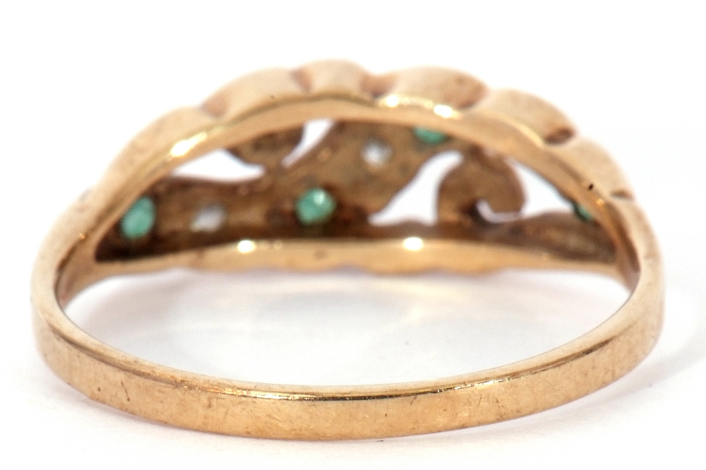 9ct gold emerald and diamond ring, the pierced carved mount alternate set with four small emeralds - Image 5 of 7