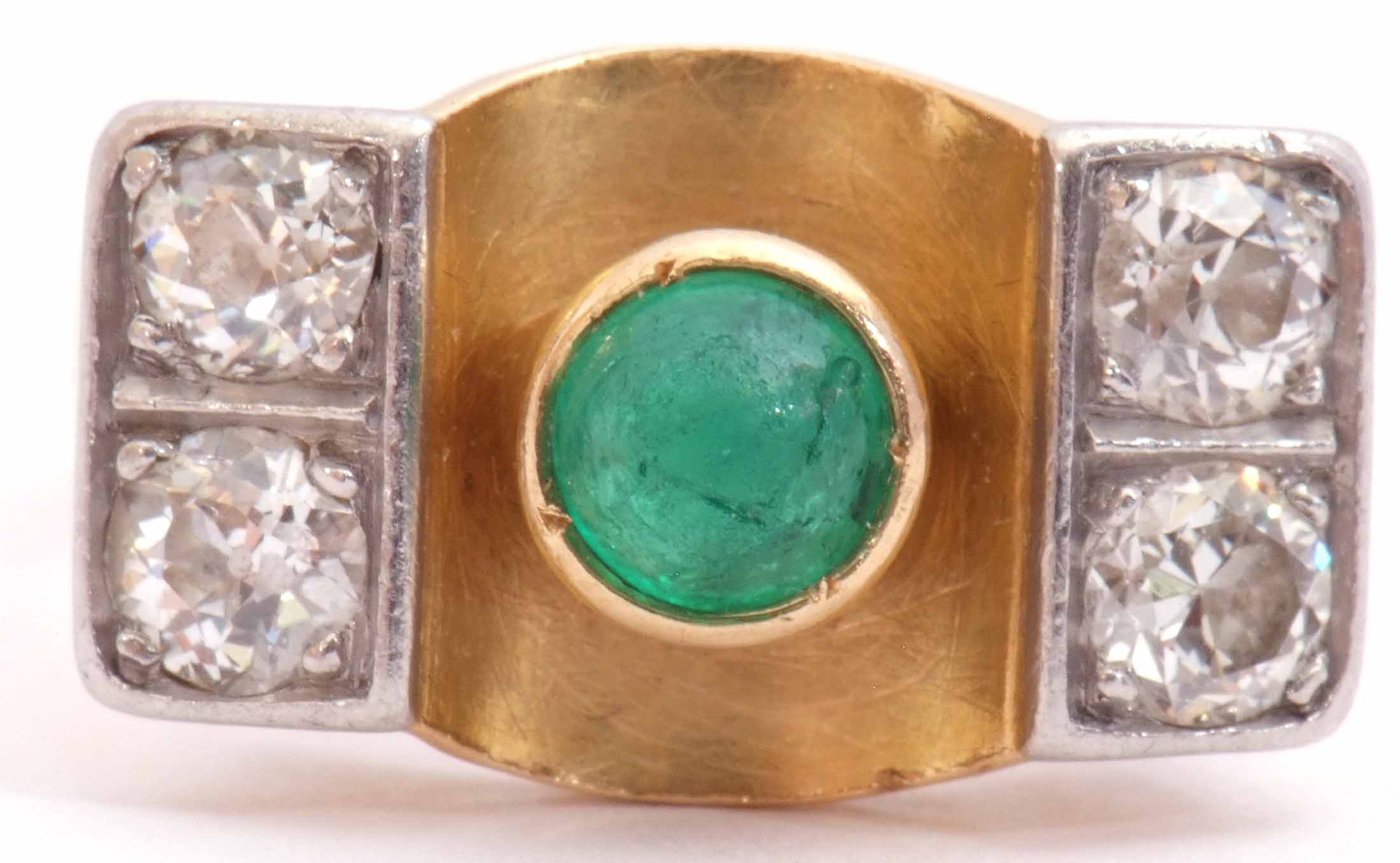 Emerald and diamond stylised ring, the cabochon round cut emerald collet set in a central concave
