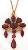 Vintage Bohemian garnet necklace, a fan shaped set with graduated cut foil backed garnets with