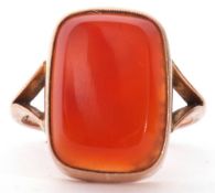 9ct stamped carnelian dress ring, the rectangular cut carnelian 18 x 12mm, bezel set and raised