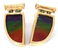 Pair of ammolite earrings, a tusk design, each with a bezel set ammolite stone in 18K mounts, 2cm