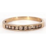 Diamond half hoop ring featuring ten channel set round brilliant cut diamonds, 0.25ct approx, in