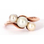 9ct stamped and cultured pearl cross-over ring featuring three graduated cultured pearls raised