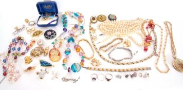 Large quantity of costume jewellery to include Swarovski ring, bracelet and necklace, brooches,