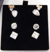 Four pairs of cubic zirconia stud earrings (one pair a/f)