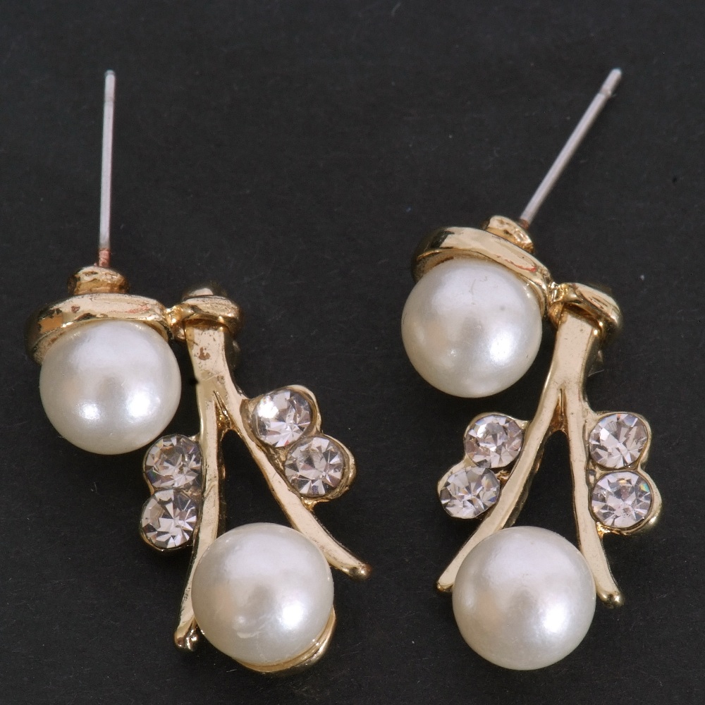 Pair of modern simulated pearl and paste set drop earrings