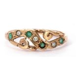 9ct gold emerald and diamond ring, the pierced carved mount alternate set with four small emeralds