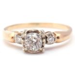 Diamond ring featuring an old cut diamond, 0.25ct approx, in an illusion setting flanked by two