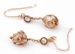 Pair of antique baroque pearl drop earrings, each with a boulder shape pearl in a beaded strap