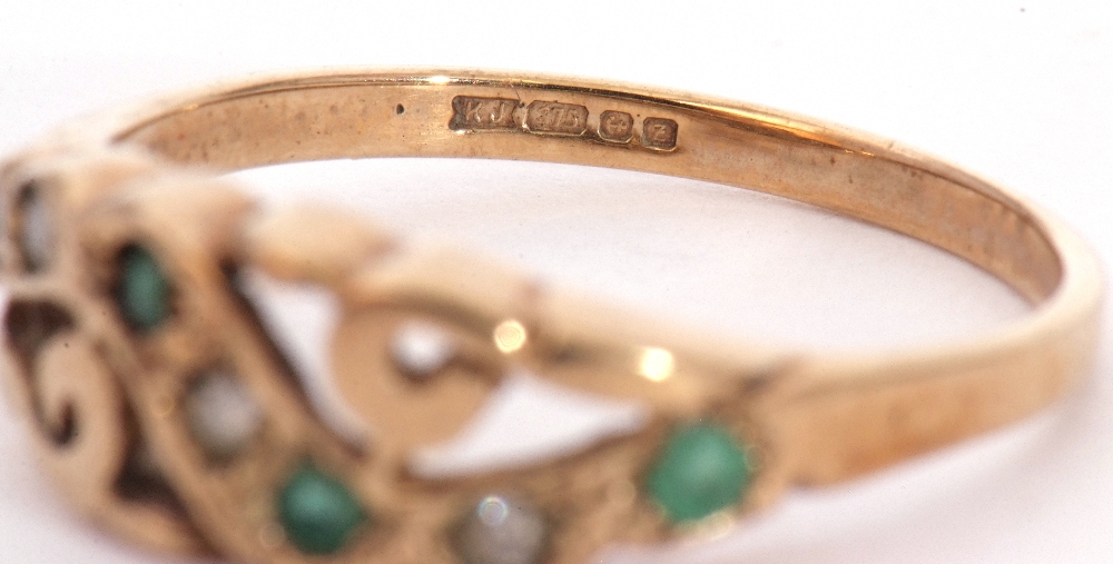 9ct gold emerald and diamond ring, the pierced carved mount alternate set with four small emeralds - Image 7 of 7