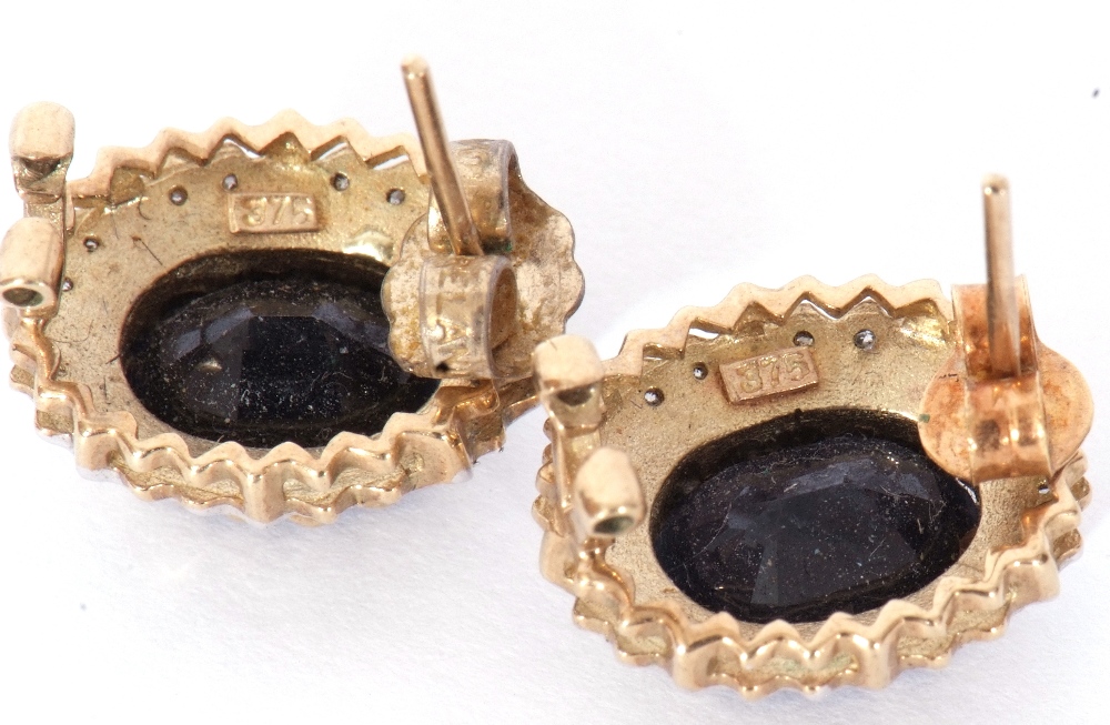 Pair of modern 9ct gold diamond and synthetic sapphire earrings, the faceted oval sapphires in a cut - Image 7 of 7
