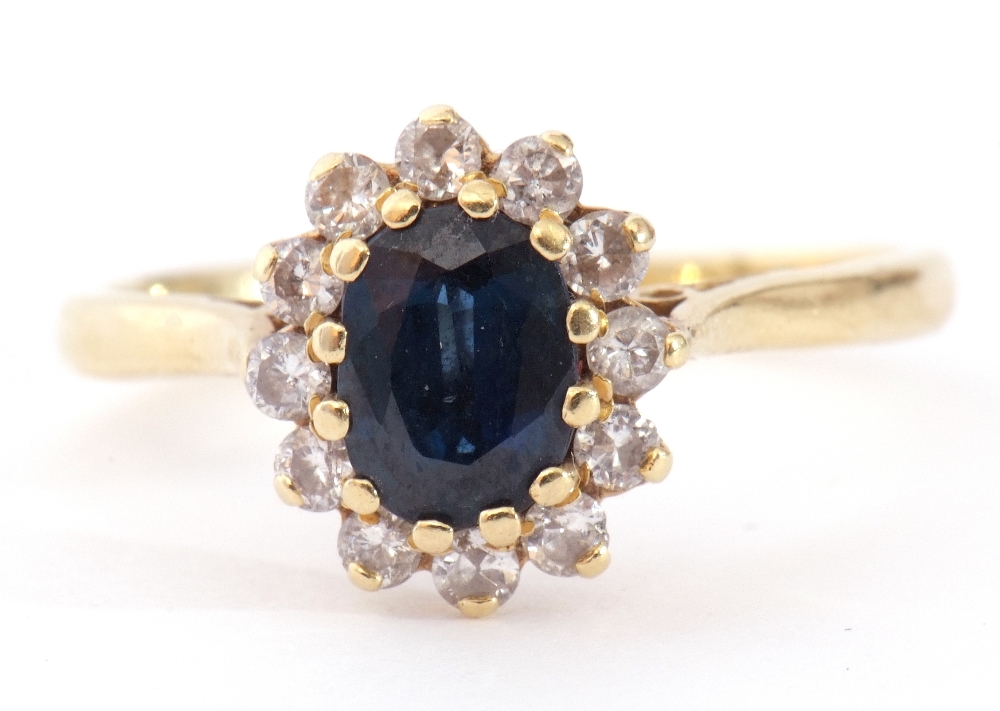 18ct gold sapphire and diamond cluster ring, the oval shaped faceted sapphire 6 x 4mm, within a - Image 3 of 9