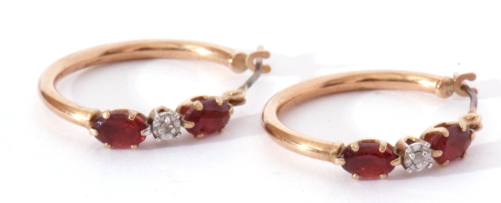 Pair of 9ct stamped hoop earrings highlighted with central diamond point between two small red - Image 6 of 6